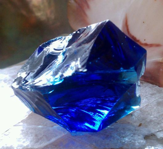Starlight Sapphire From cobalt to light blue, is a conduit of the pure “Blue Ray”. Emanating from the core of the universe, its vibration is the holographic stream of the now, limitless as are we. Restores grace, balance, peace and harmony. It holds the mother energy and is a channel for divine energy.